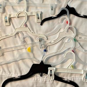 Gently used toddler/little kid plastic hanger 10 pant/ 10 skirt hangers